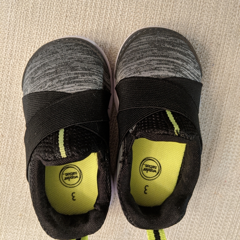 Three pairs of infant tennis shoes
